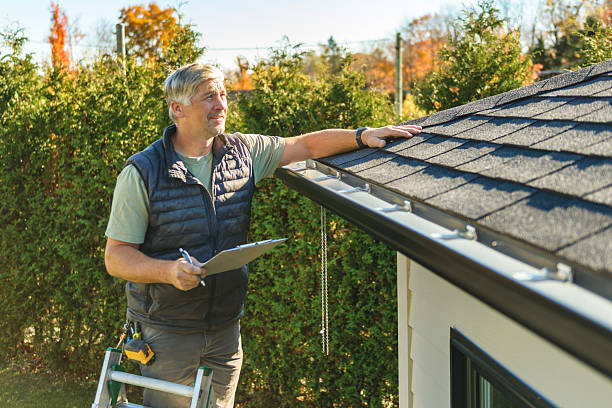 Professional Roof Inspection technician working in Wellston, MI